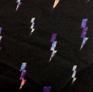 Lightning on Black Poly Blend Interlock Fabric - Nature's Fabrics