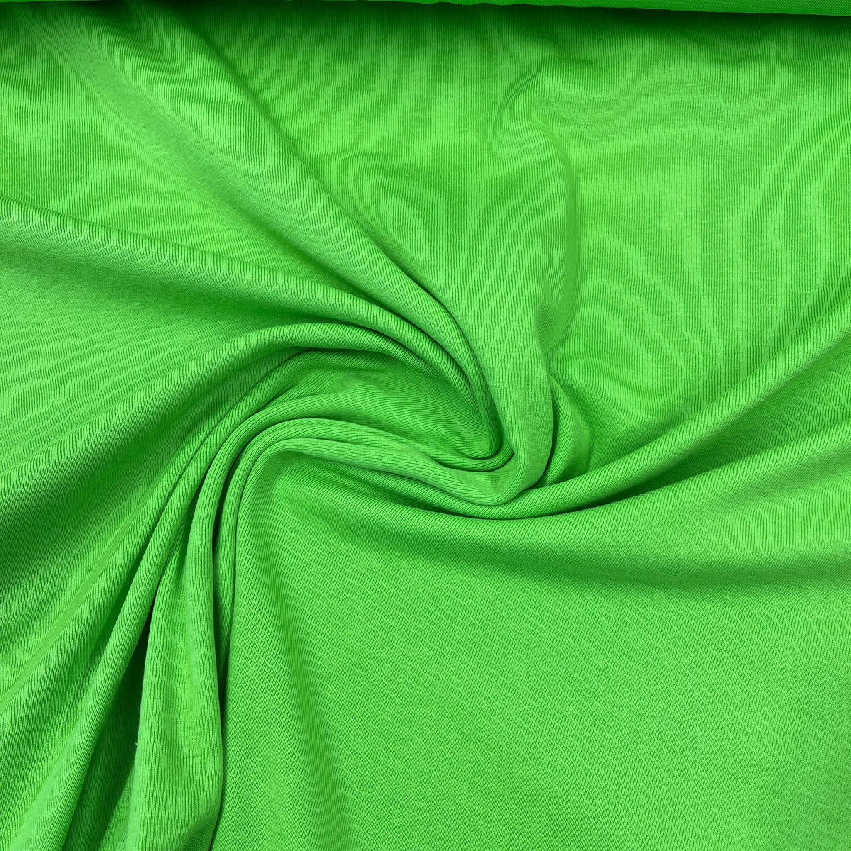 Vibrant lime green natural fabric from Nature's Fabrics with a spiral draped texture.