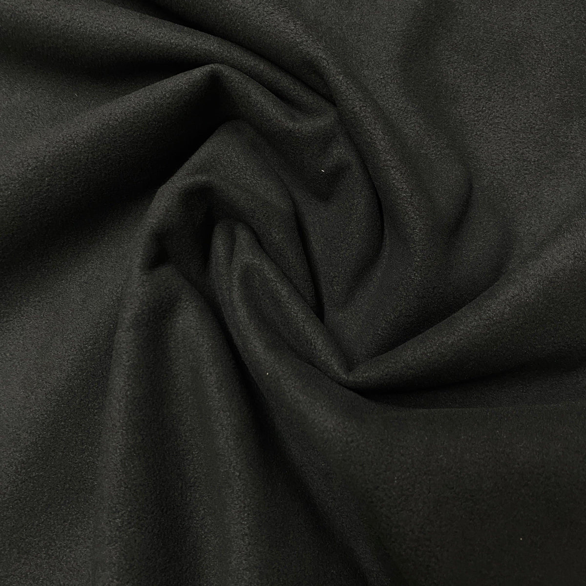 Close-up of draped black natural fabric from Nature's Fabrics