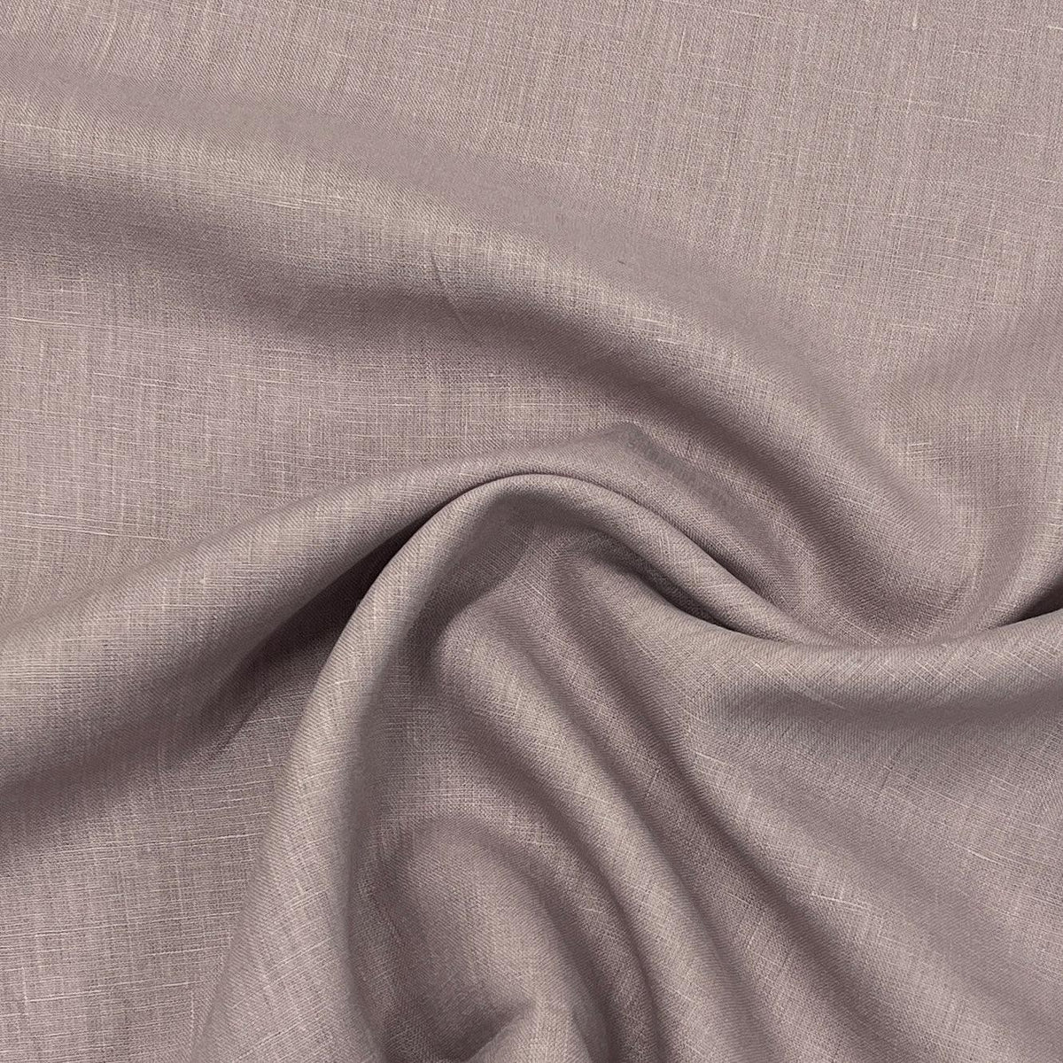 Close-up of draped mauve grey premium natural fabric from Nature's Fabrics