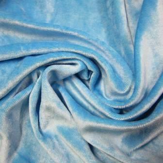 Light blue velvet fabric draped in soft folds from Nature's Fabrics