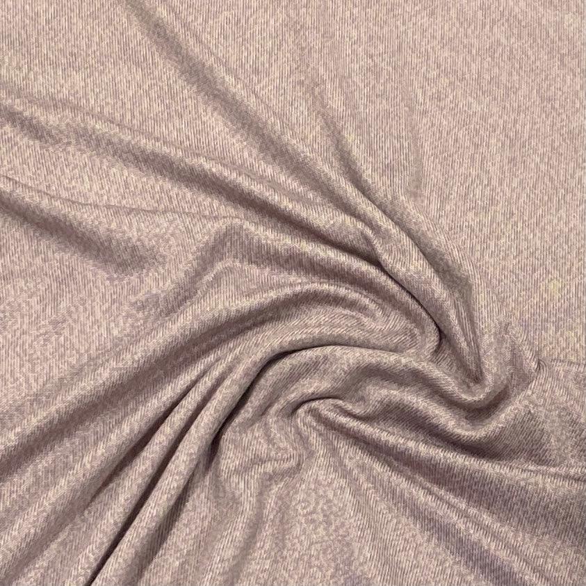 Close-up of draped mauve natural fabric from Nature's Fabrics.