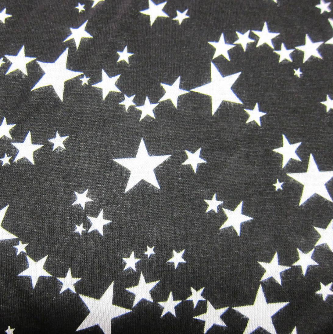 Milky Way Stars on Black Cotton/Poly Jersey Fabric - Nature's Fabrics