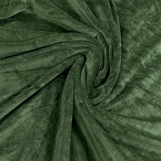 Nature's Fabrics dark green velvet fabric draped in soft folds