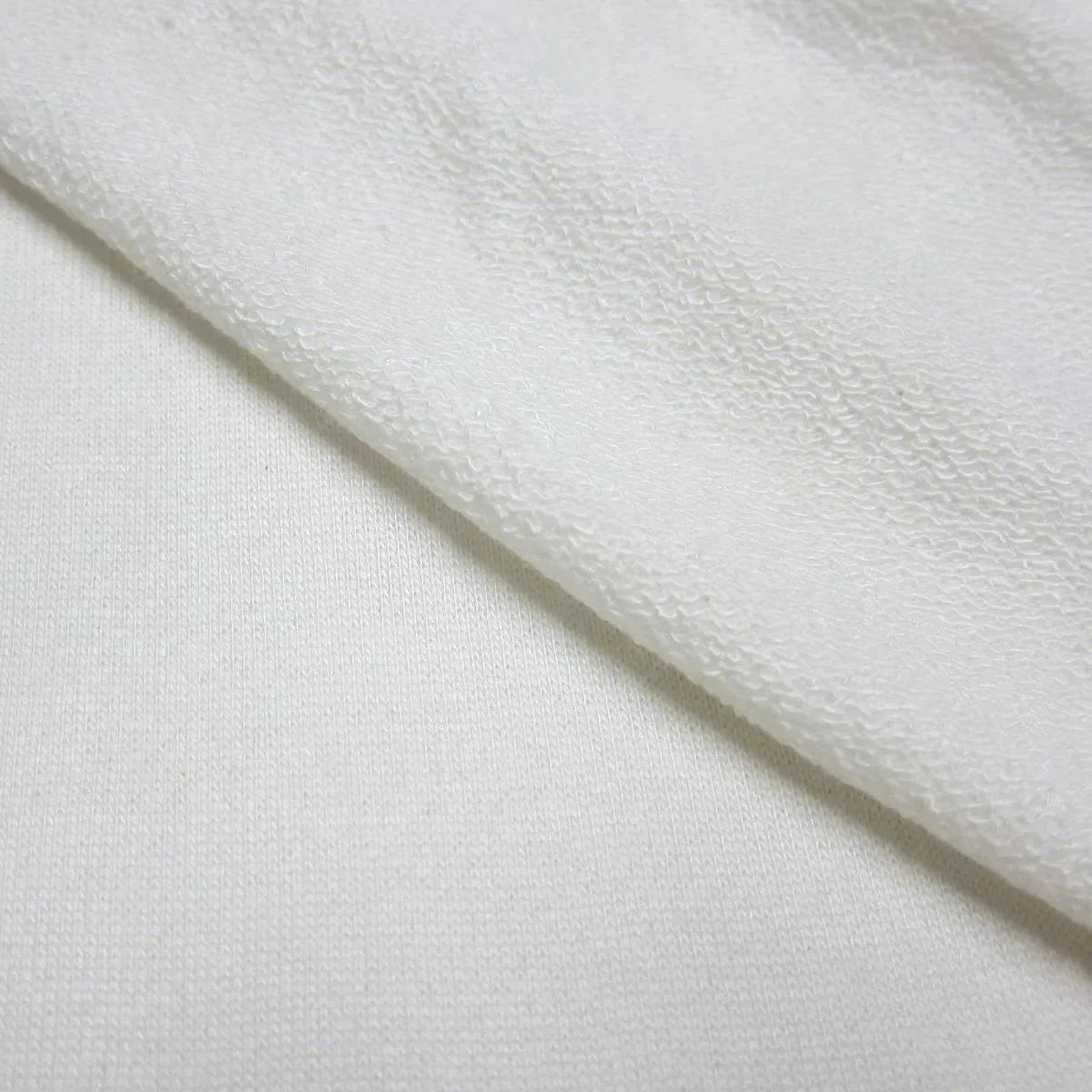 Close-up of white premium natural fabric by Nature's Fabrics