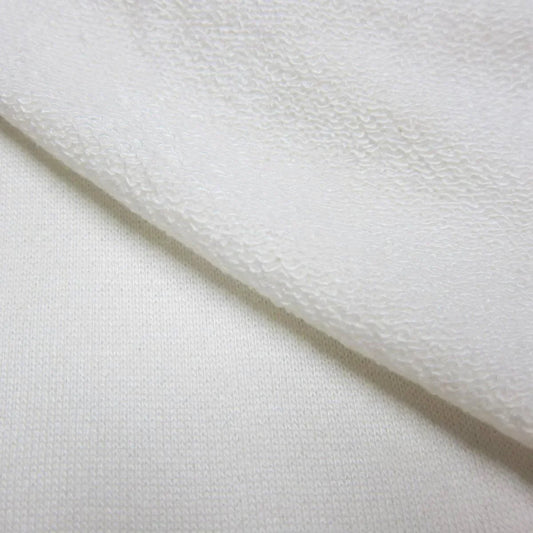 Close-up of white textured natural fabric from Nature's Fabrics