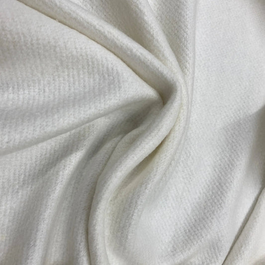 Close-up of draped white organic cotton fabric from Nature's Fabrics