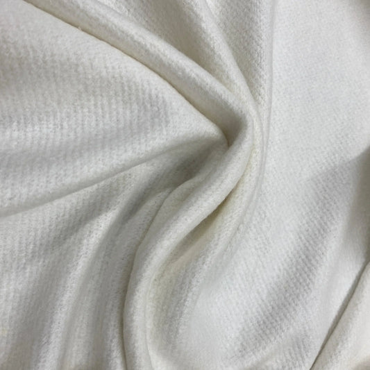Close-up of draped white organic cotton fabric from Nature's Fabrics.