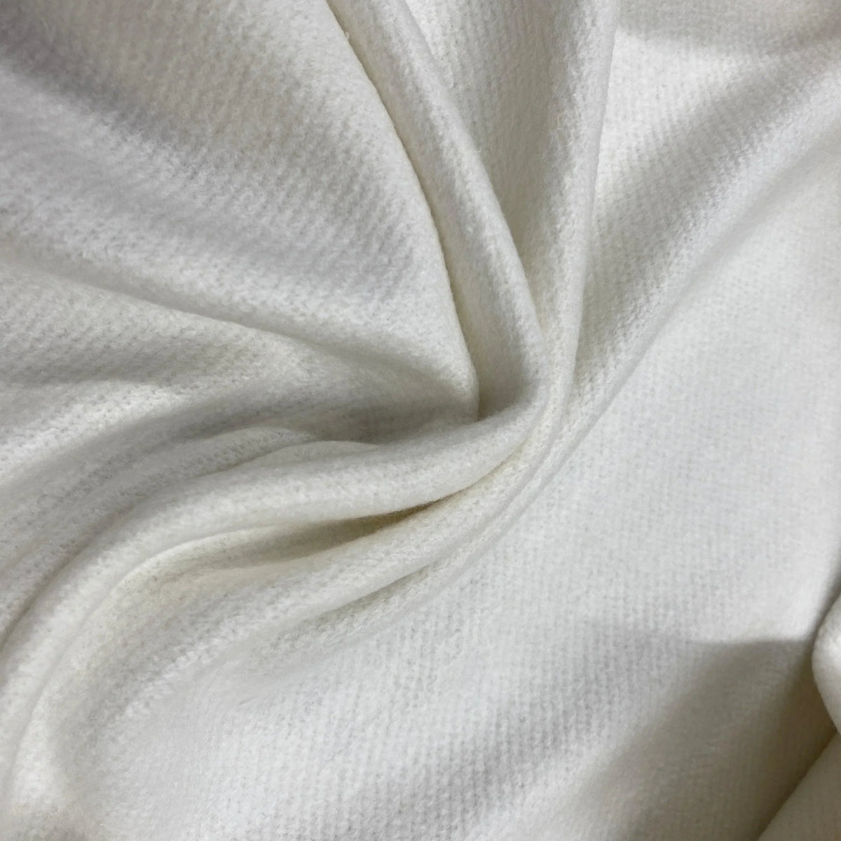 Close-up of draped white organic fabric from Nature's Fabrics