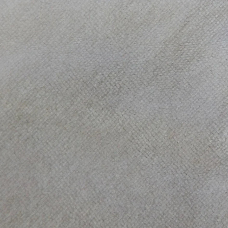 Close-up of a light gray textured natural fabric from Nature's Fabrics