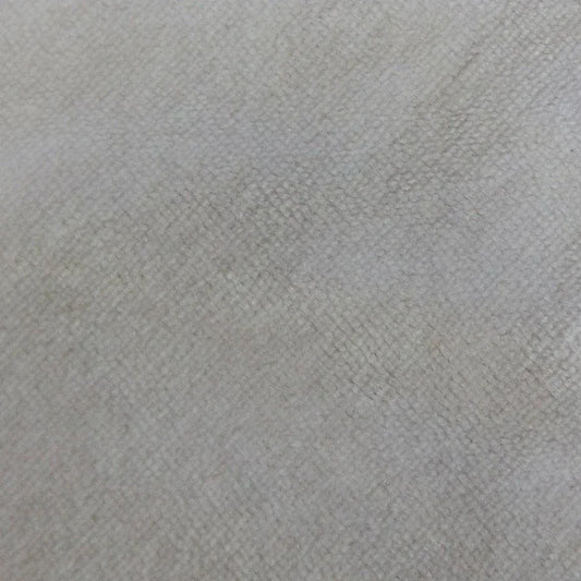 Close-up of a light grey textured natural fabric from Nature's Fabrics.
