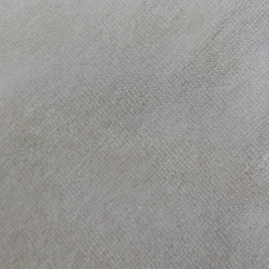 Close-up texture of a neutral beige natural fabric from Nature's Fabrics