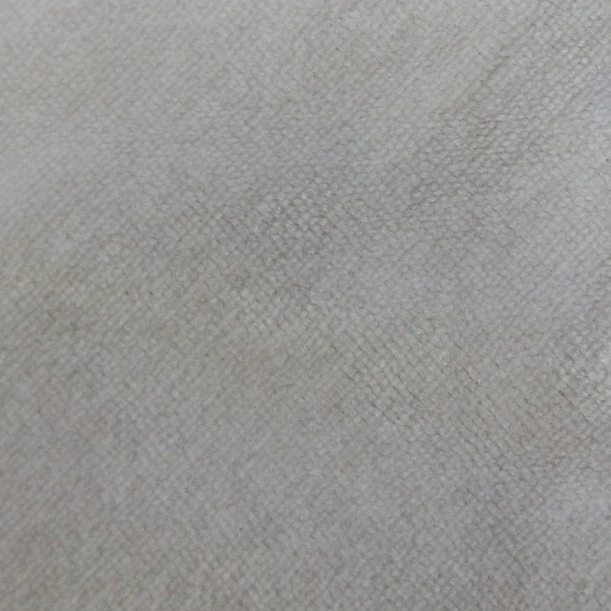 Close-up of Nature's Fabrics premium light grey natural textured fabric.