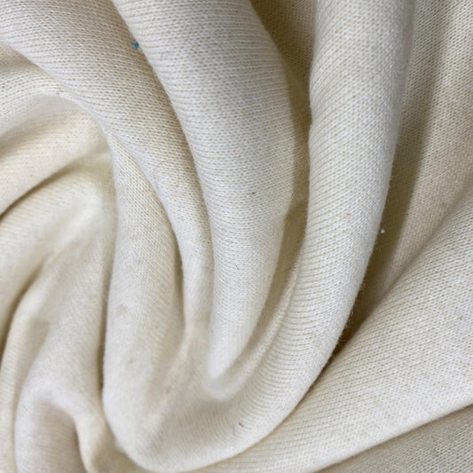 Close-up of draped white organic cotton fabric from Nature's Fabrics