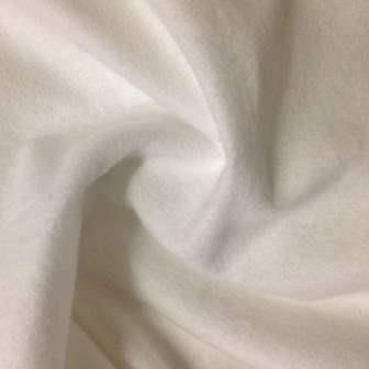 Close-up of draped white organic fabric from Nature's Fabrics