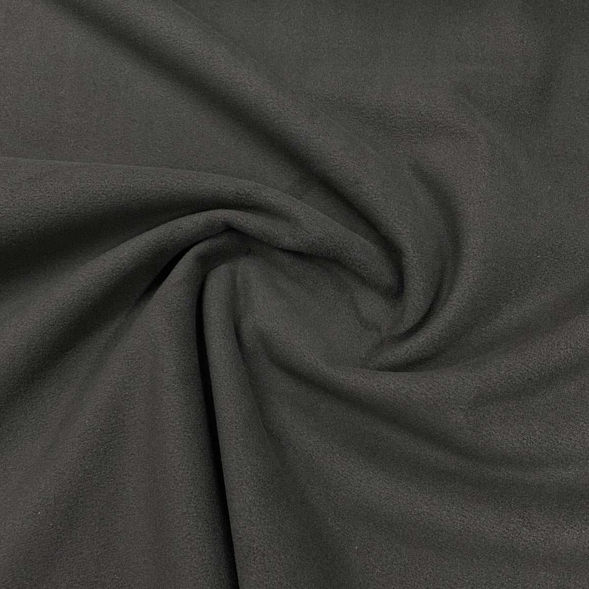 Nature's Fabrics charcoal grey soft textured fabric draped in folds