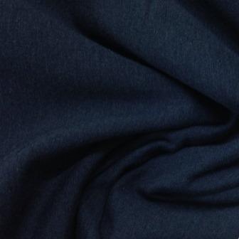 Close-up of navy blue premium natural fabric draped in folds from Nature's Fabrics.