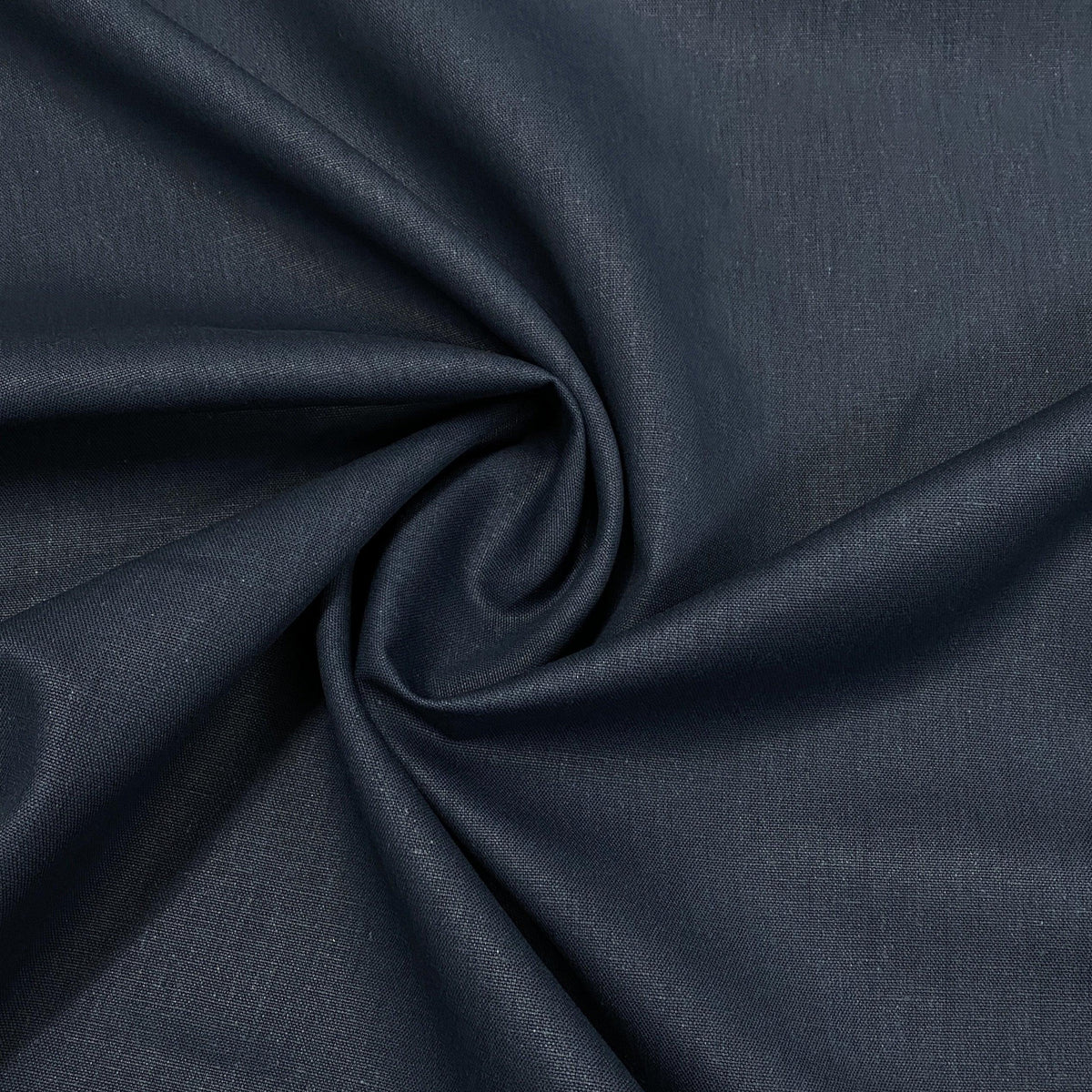 Swirl of charcoal grey premium natural fabric from Nature's Fabrics.