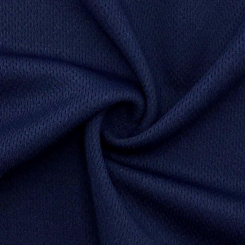 Close-up of navy blue textured fabric from Nature's Fabrics.