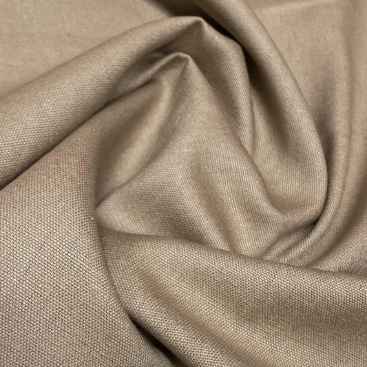Close-up of draped beige natural fabric by Nature's Fabrics