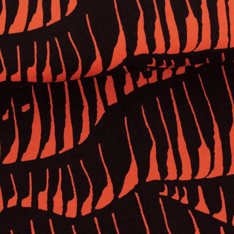 Northern Lights on Rust Organic Cotton/Spandex Jersey Fabric - Nature's Fabrics