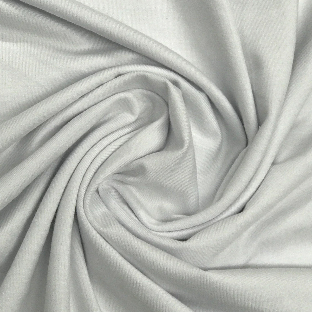 Swirl of premium white organic cotton fabric from Nature's Fabrics