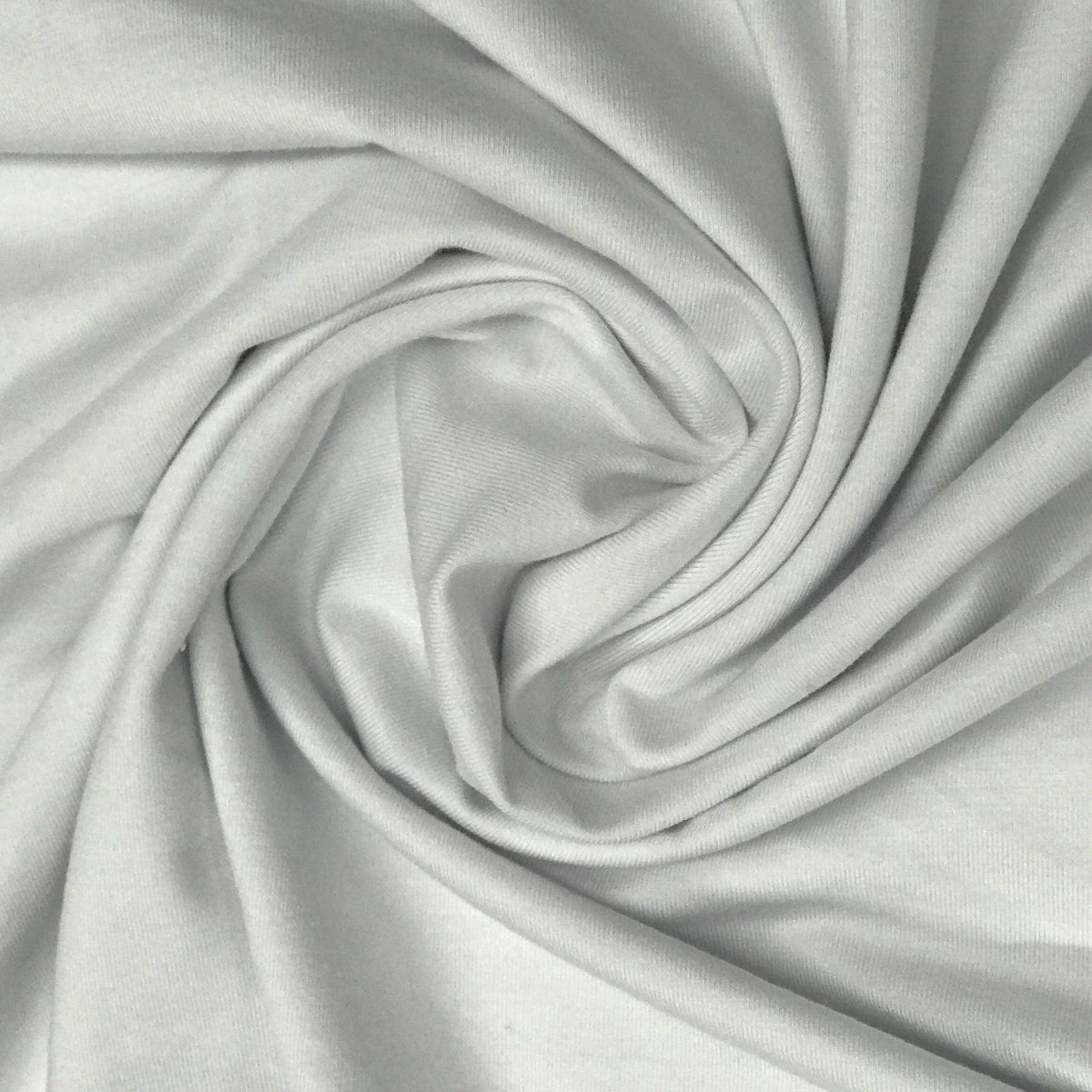 Swirl of premium white organic cotton fabric from Nature's Fabrics