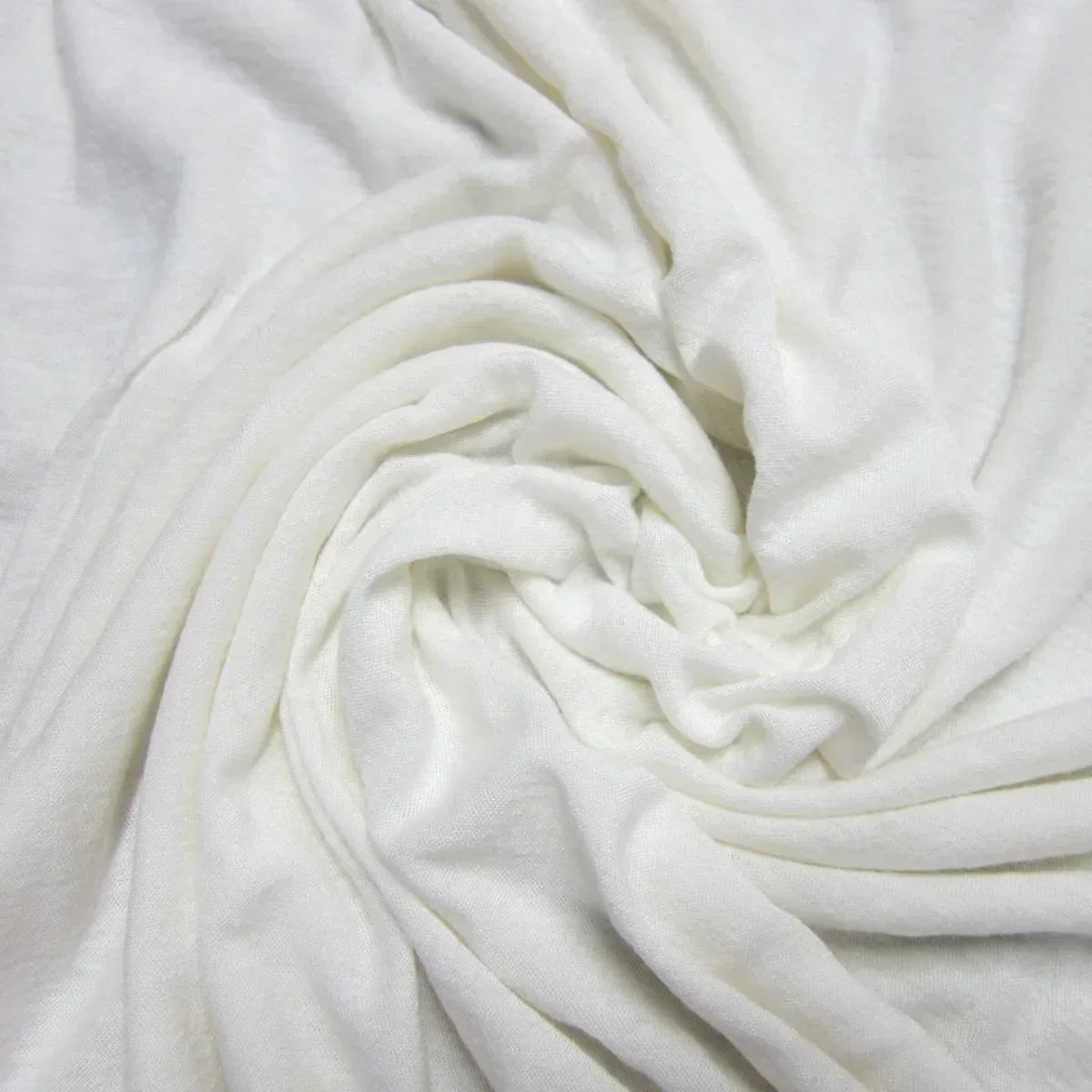 Swirled white organic cotton fabric from Nature's Fabrics