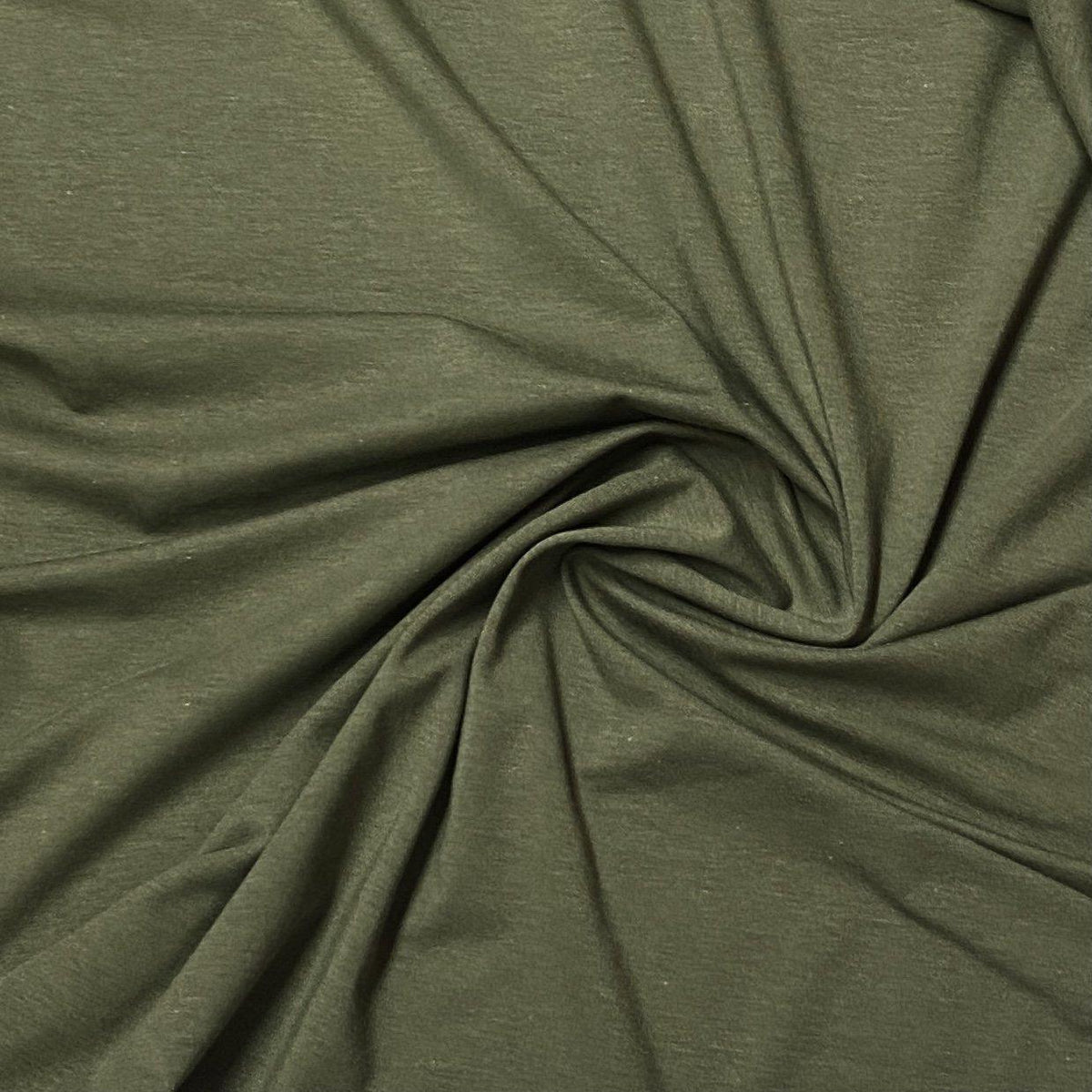 Nature's Fabrics olive green natural fabric draped in a spiral fold