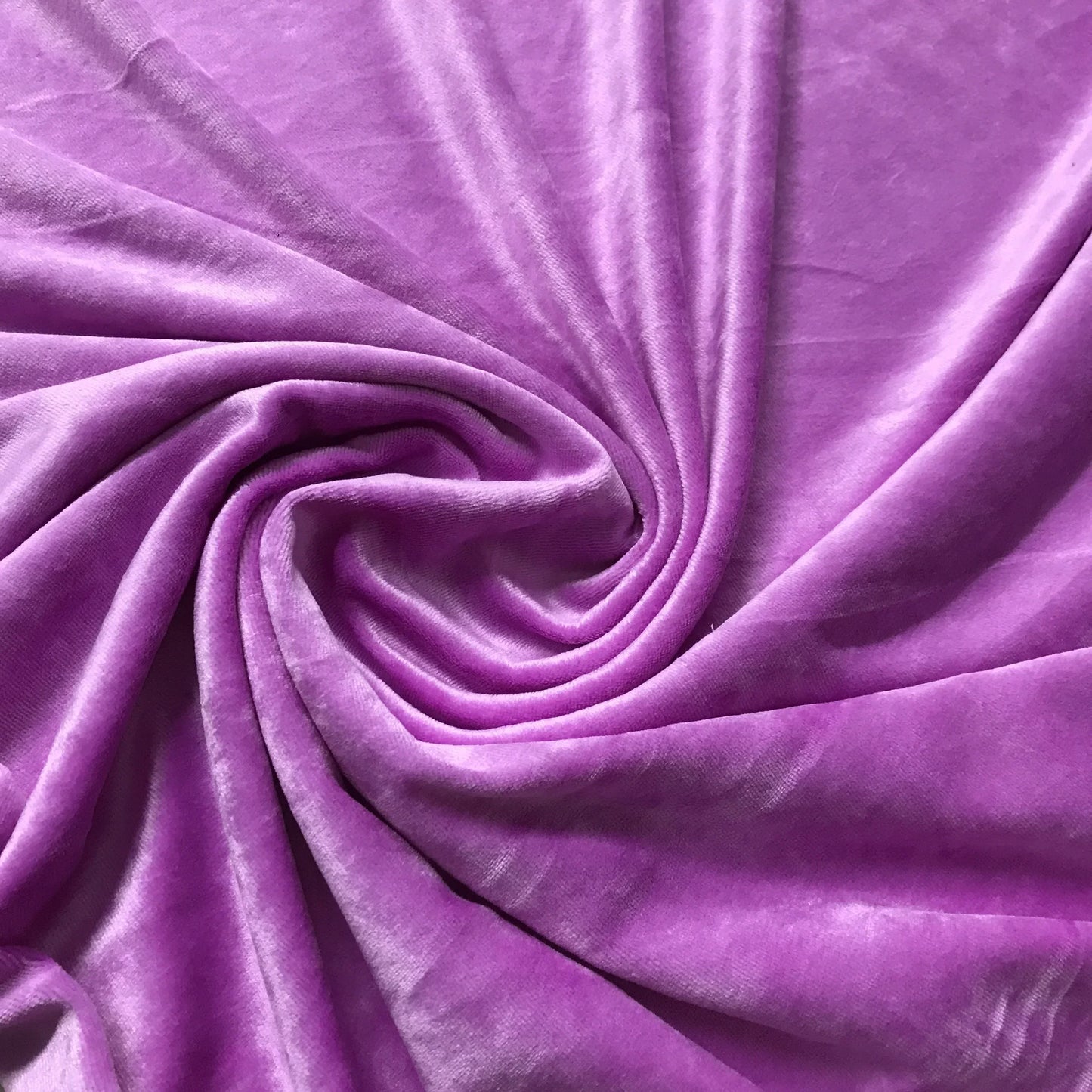 Purple velvet fabric swirled in a spiral from Nature's Fabrics