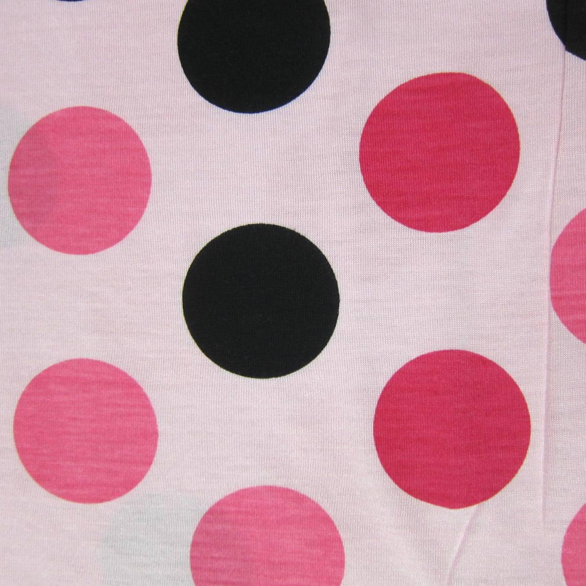 Nature's Fabrics light pink fabric with black and bright pink polka dots.