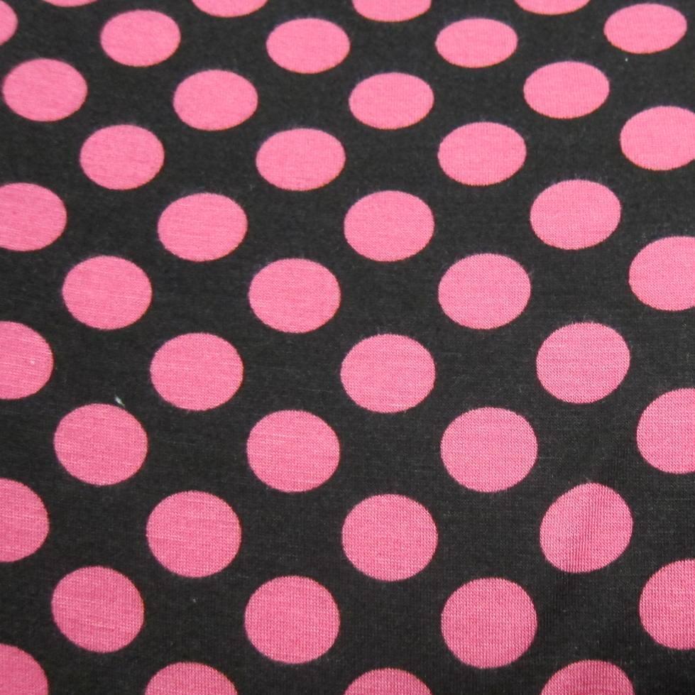 Nature's Fabrics pink polka dot pattern on black fabric