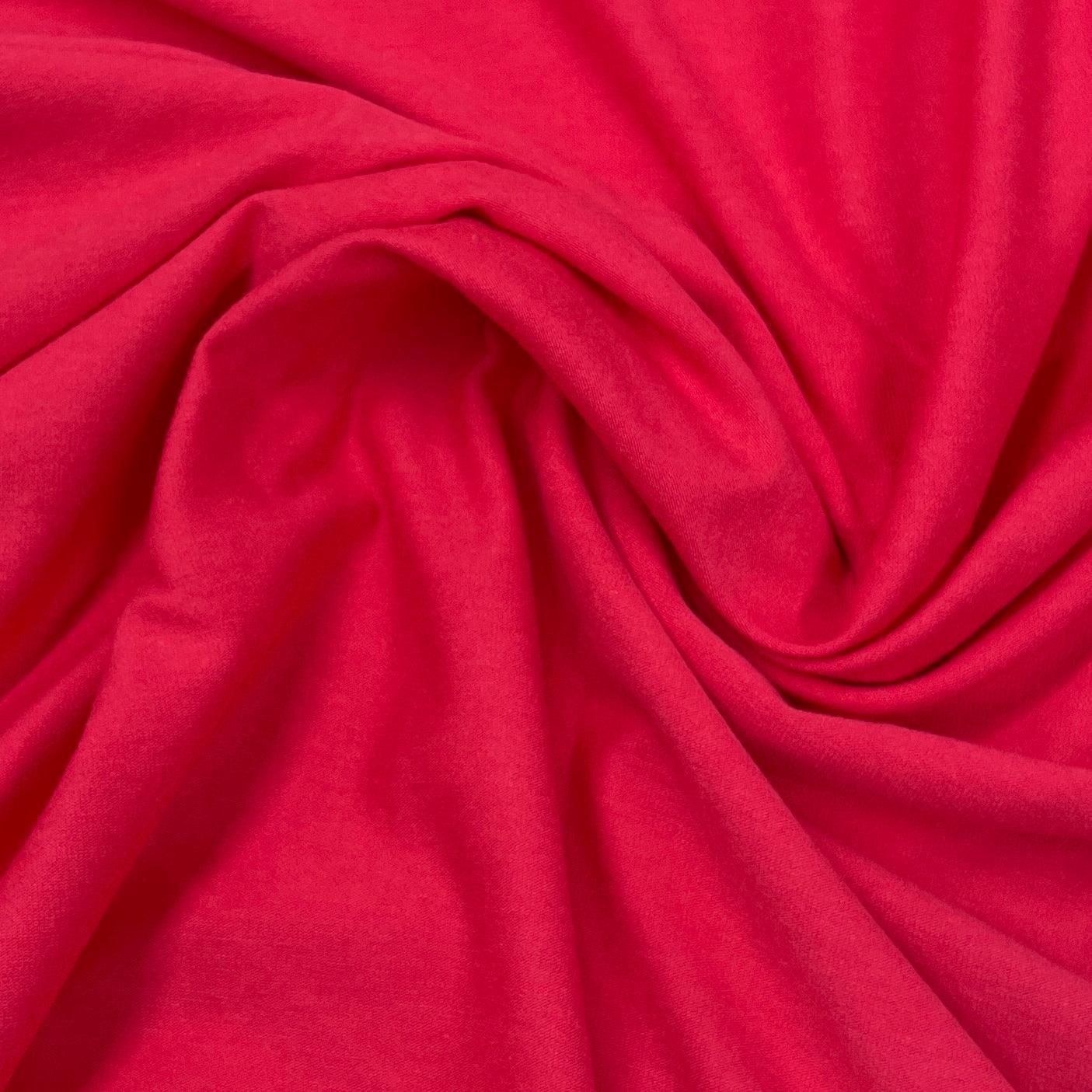 Close-up of draped vibrant red natural fabric from Nature's Fabrics.