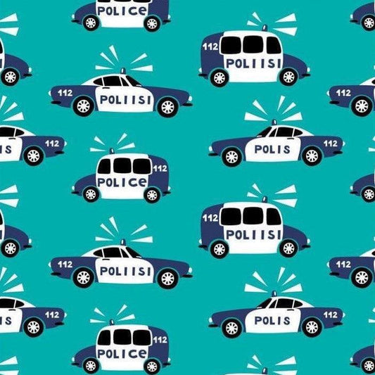 Nature's Fabrics pattern featuring blue and white police cars on a teal background.