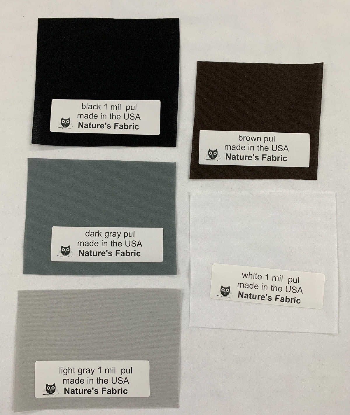 Nature's Fabric PUL fabric swatches in black, brown, dark gray, white, and light gray.