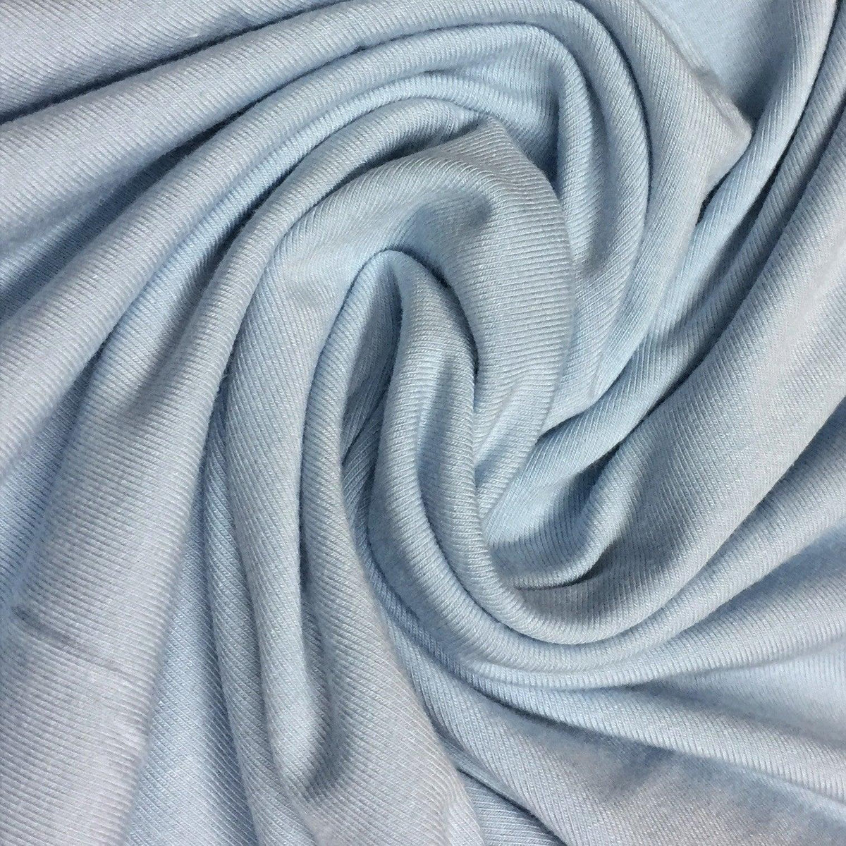 Swirled light blue organic cotton fabric from Nature's Fabrics
