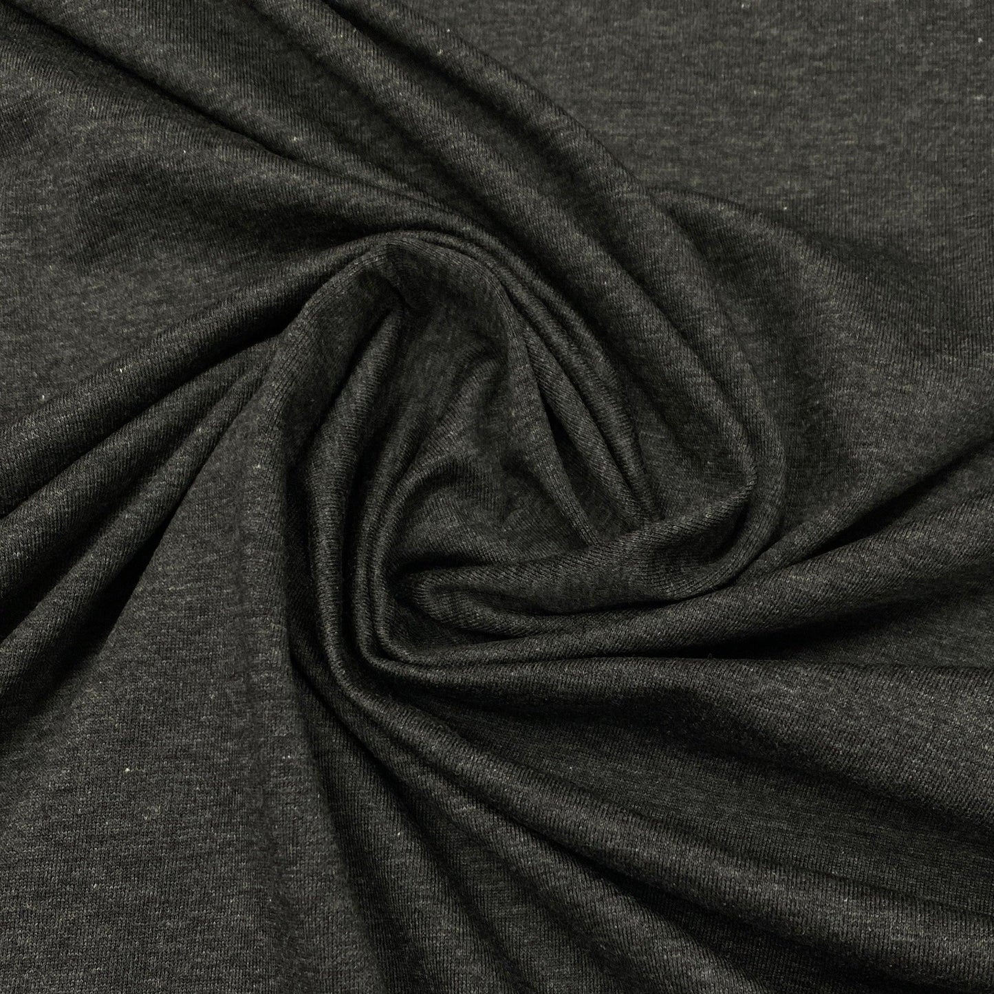 Charcoal grey natural fabric swirled and draped from Nature's Fabrics