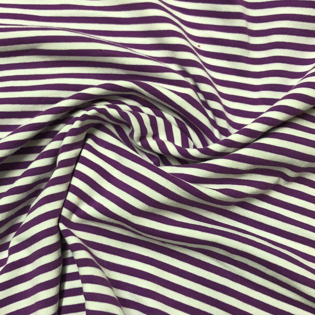 Purple and white striped organic cotton fabric from Nature's Fabrics