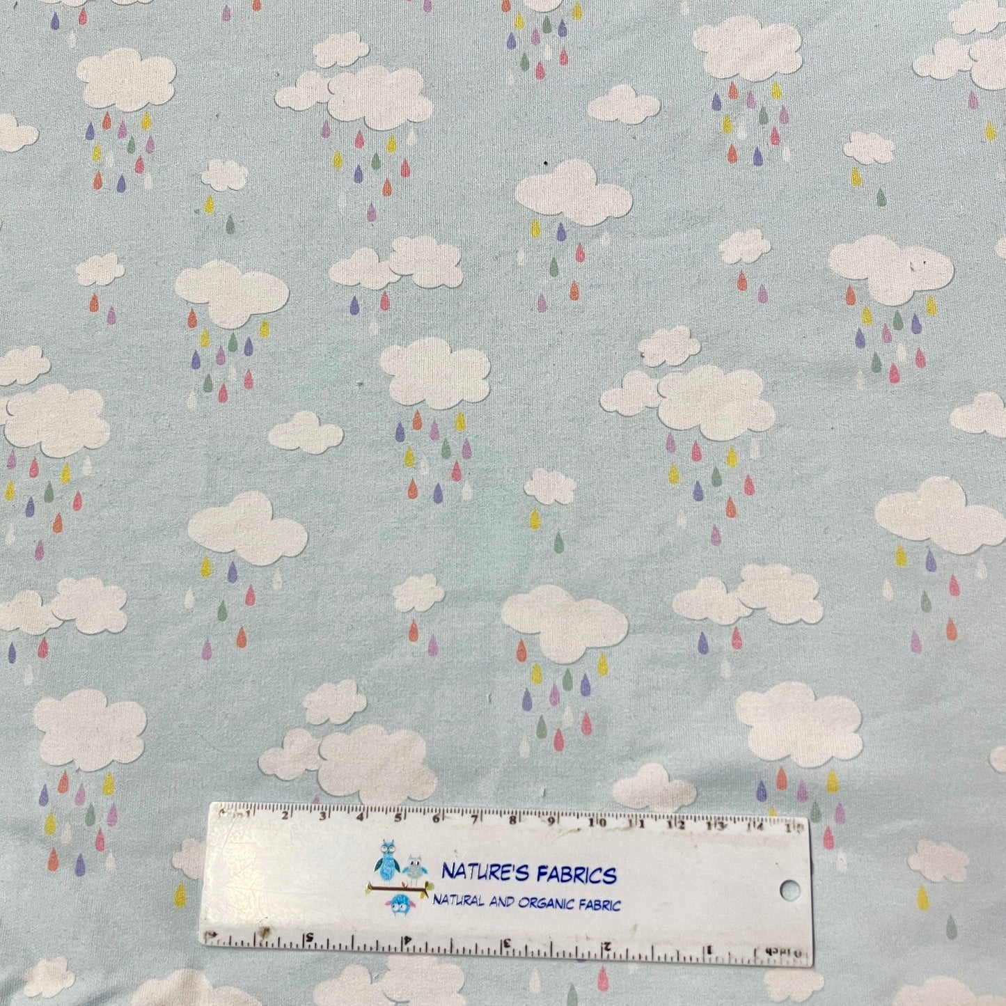 Rainbow Rain on Light Blue Bamboo Stretch French Terry Fabric - Nature's Fabrics