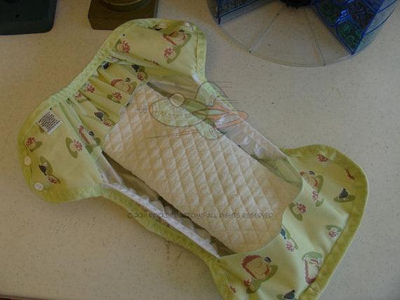 Nature's Fabrics lime green patterned cloth diaper with quilted white insert