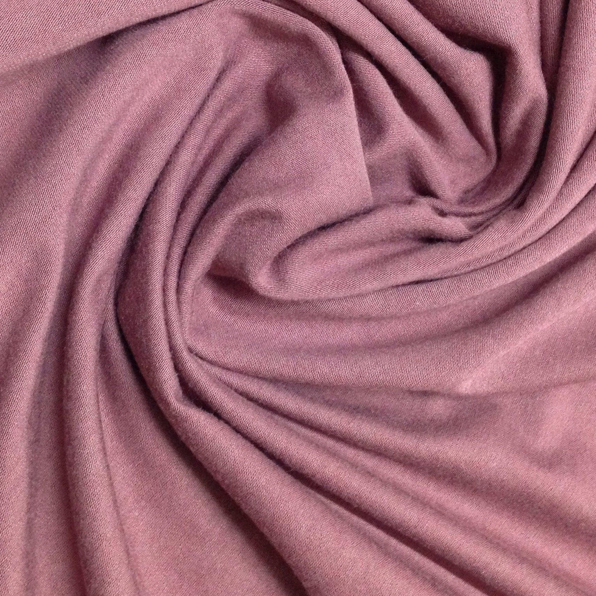 Draped mauve organic cotton fabric from Nature's Fabrics