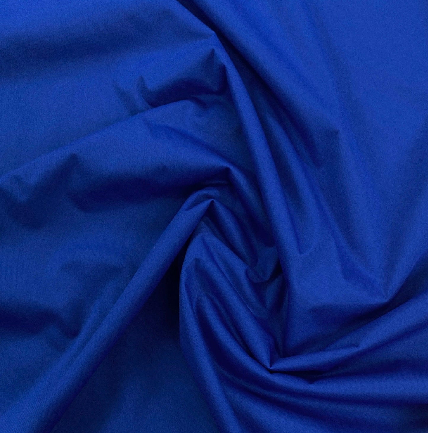 Draped royal blue premium natural fabric from Nature's Fabrics