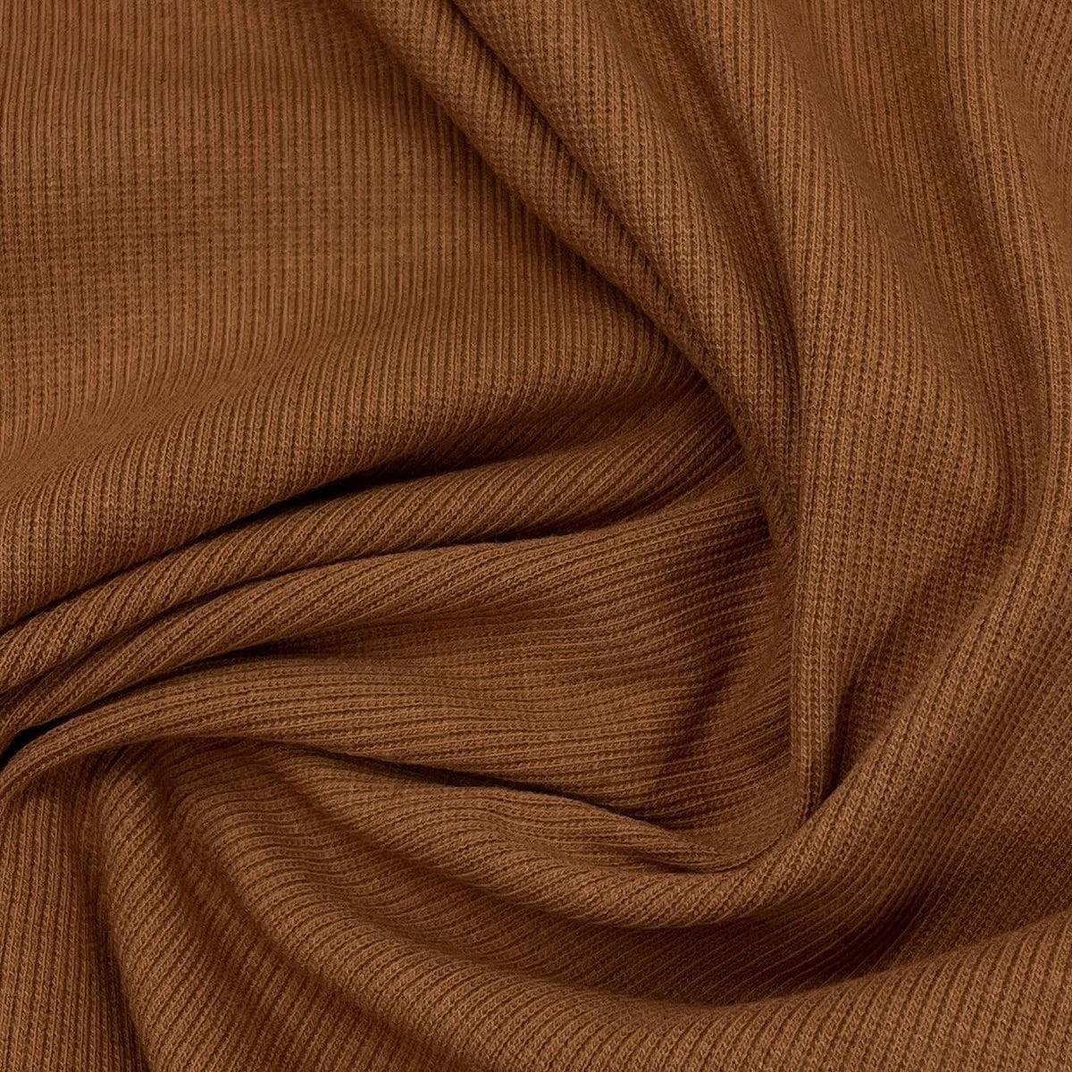 Nature's Fabrics brown ribbed knit fabric with soft draped folds