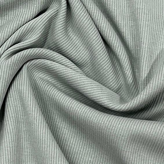 Nature's Fabrics sage green ribbed knit fabric with soft folds