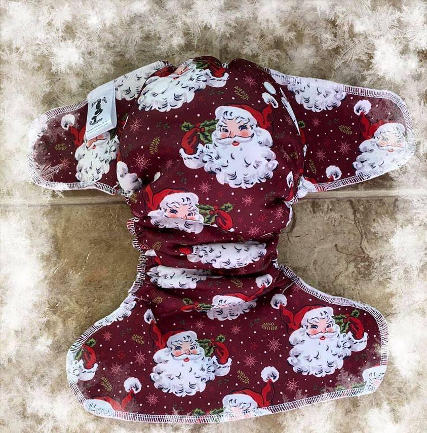 Nature's Fabrics maroon fabric face mask with vintage Santa Claus print