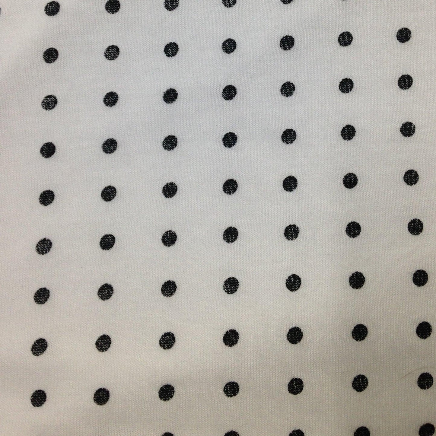 Small Black Dots on White Cotton/Poly Jersey Fabric - Nature's Fabrics