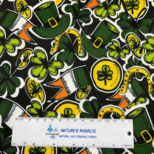 St. Patrick's Day themed green fabric with shamrocks and hats from Nature's Fabrics.
