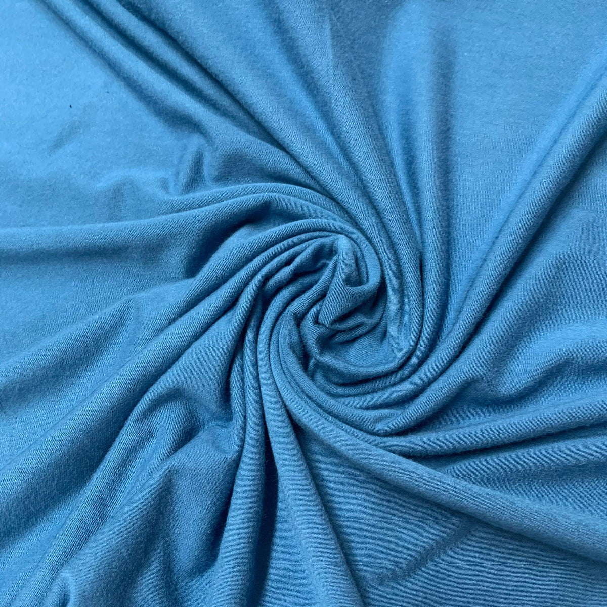 Swirled blue natural fabric from Nature's Fabrics.