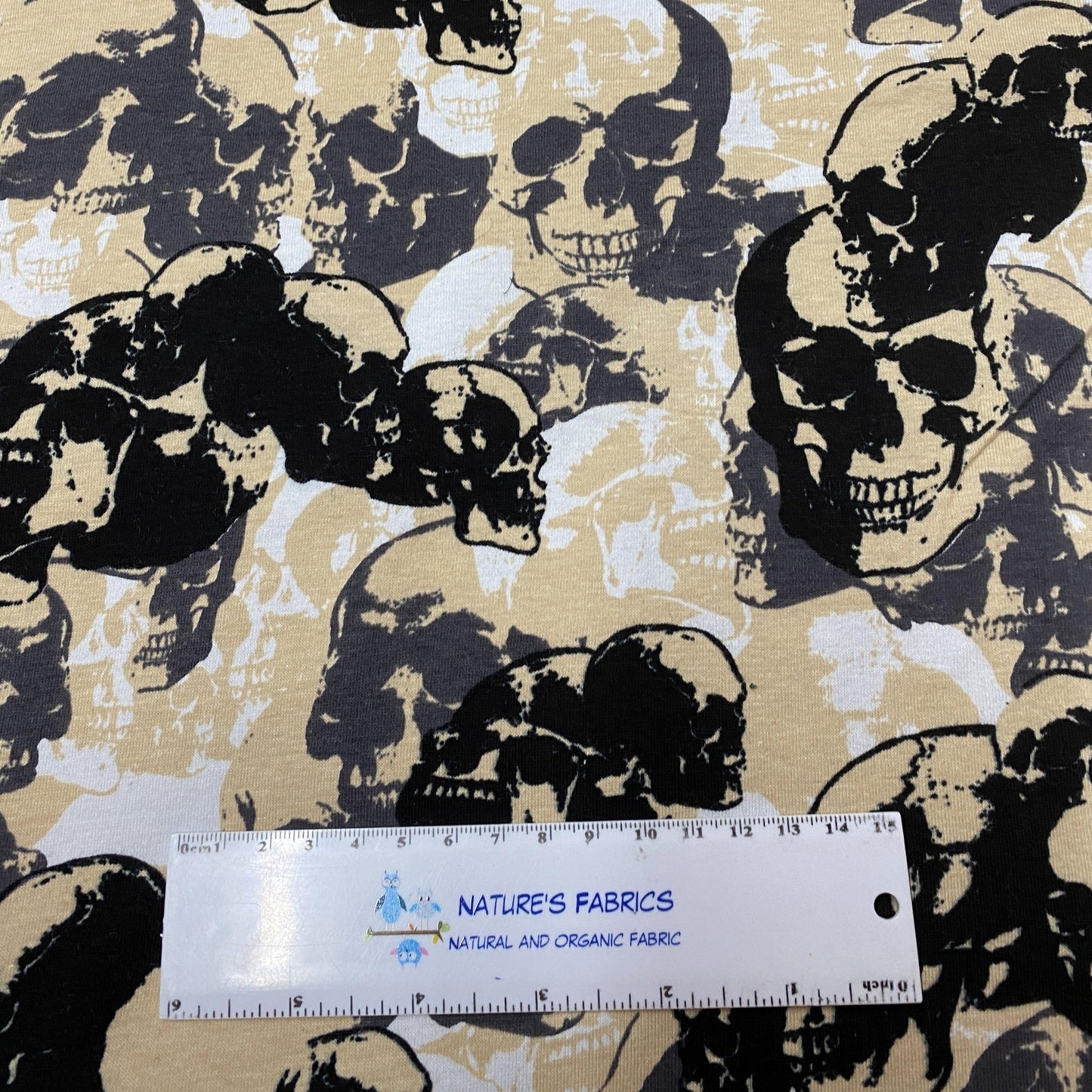 Tan and Black Skull Camouflage on Cotton/Spandex Jersey Fabric - Nature's Fabrics