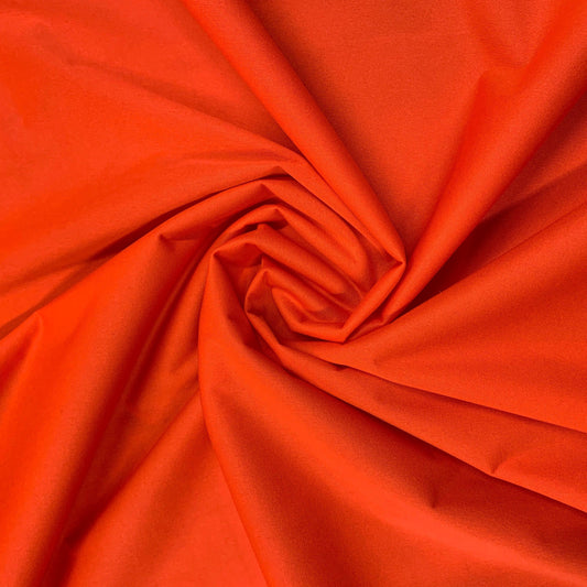 Swirl of vibrant orange premium fabric from Nature's Fabrics